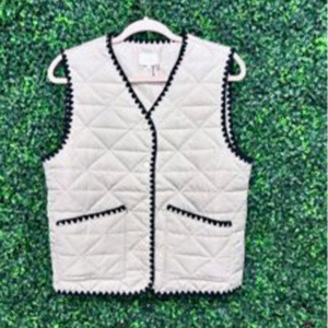 Cream quilted vest with black trim